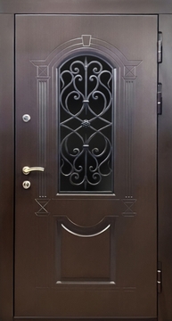 Входная остекленная дверь с кованой решеткой (отделка панелями МДФ с фрезеровкой) Входная остекленная дверь с кованой решеткой (отделка панелями МДФ с фрезеровкой)